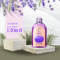 Botella de aceite de masaje de lavanda 130ml sobre fondo natural