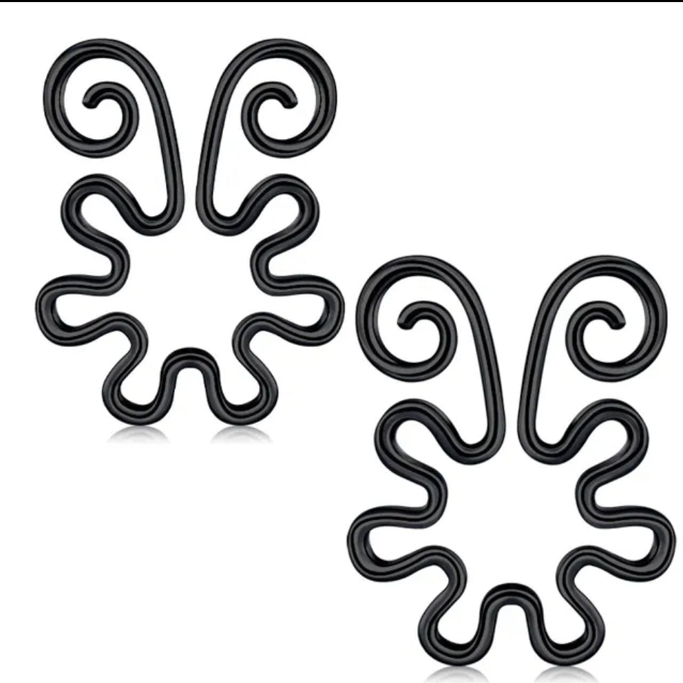 Estas pezoneras con alas decorativas simulan piercings de forma segura y sensual. Diseño sin perforación que estimula y adorna. Ideal para lencería sexy.