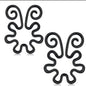 Estas pezoneras con alas decorativas simulan piercings de forma segura y sensual. Diseño sin perforación que estimula y adorna. Ideal para lencería sexy.